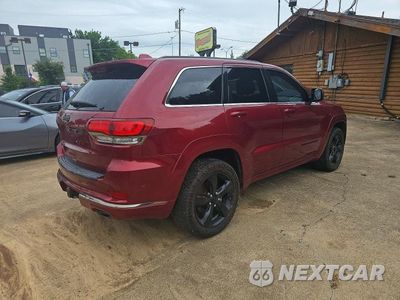 Czwarte zdjęcie samochodu z boku: 2015 JEEP GRAND CHEROKEE OVERLAND VIN:1C4RJFCM0FC112892 - miniatura