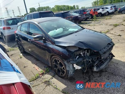 Czwarte zdjęcie samochodu z boku: 2013 FORD FOCUS ST VIN:1FADP3L98DL127517 - miniatura
