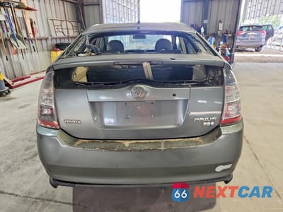 Zdjęcie 6 z 13 samochodu: 2005 TOYOTA PRIUS BASE VIN:JTDKB20U953042657 - miniatura