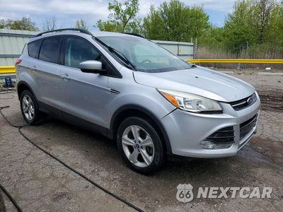 Czwarte zdjęcie samochodu z boku: 2016 FORD ESCAPE SE VIN:1FMCU9GXXGUC56007 - miniatura