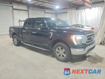Czwarte zdjęcie samochodu z boku: 2021 FORD F150 SUPERCREW VIN:1FTFW1ED0MFC14998 - miniatura