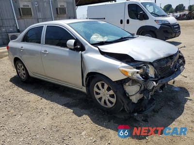Czwarte zdjęcie samochodu z boku: 2010 TOYOTA COROLLA LE VIN:1NXBU4EEXAZ256466 - miniatura
