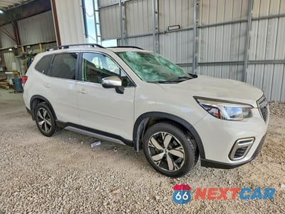 Czwarte zdjęcie samochodu z boku: 2021 SUBARU FORESTER TOURING VIN:JF2SKAXC6MH518874 - miniatura