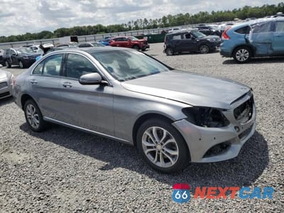 Czwarte zdjęcie samochodu z boku: 2016 MERCEDES-BENZ C 300 4MATIC VIN:55SWF4KB2GU104045 - miniatura