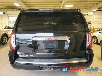 Zdjęcie 6 z 13 samochodu: 2016 GMC YUKON XL DENALI VIN:1GKS2HKJ9GR467113 - miniatura