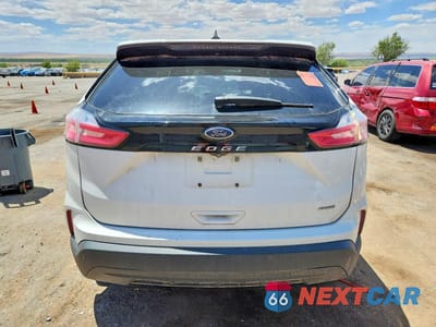 Zdjęcie 6 z 13 samochodu: 2021 FORD EDGE SE VIN:2FMPK4G97MBA40712 - miniatura