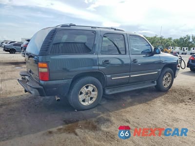 Trzecie zdjęcie samochodu z tyłu: 2004 CHEVROLET TAHOE K1500 VIN:1GNEK13ZX4J233889 - miniatura