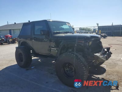 Czwarte zdjęcie samochodu z boku: 2012 JEEP WRANGLER SPORT VIN:1C4AJWAG6CL192205 - miniatura