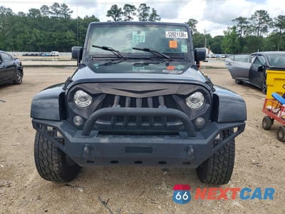 Piąte zdjęcie samochodu w środku: 2017 JEEP WRANGLER UNLIMITED SAHARA VIN:1C4BJWEG8HL600306 - miniatura