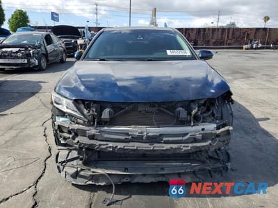 Piąte zdjęcie samochodu w środku: 2019 TOYOTA CAMRY HYBRID SE VIN:4T1B21HK7KU515941 - miniatura