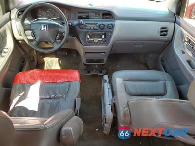 Zdjęcie 8 z 13 samochodu: 2002 HONDA ODYSSEY EXL VIN:2HKRL18002H565797 - miniatura