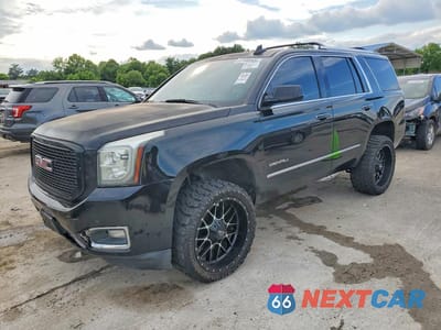 2015 GMC YUKON DENALI 1GKS2CKJ6FR660062 - główne zdjęcie licytacji z USA - miniatura