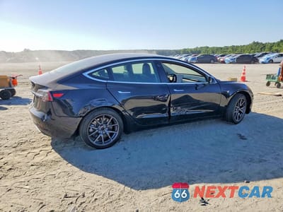 Trzecie zdjęcie samochodu z tyłu: 2019 TESLA MODEL 3 VIN:5YJ3E1EA4KF410603 - miniatura