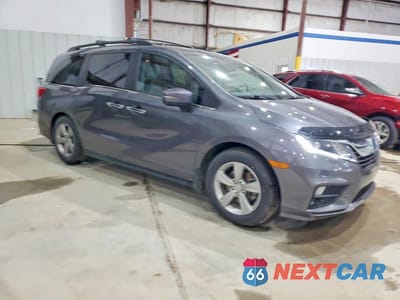Czwarte zdjęcie samochodu z boku: 2018 HONDA ODYSSEY EXL VIN:5FNRL6H76JB093970 - miniatura