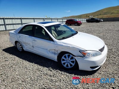 Czwarte zdjęcie samochodu z boku: 2002 TOYOTA CAMRY XLE V6 VIN:JTDBF30K420002122 - miniatura