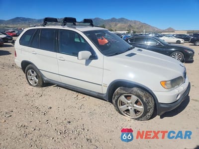 Czwarte zdjęcie samochodu z boku: 2002 BMW X5 4.4I VIN:5UXFB33572LH31394 - miniatura