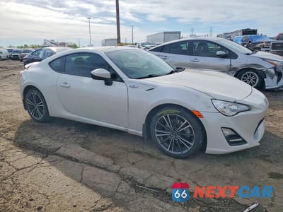 Czwarte zdjęcie samochodu z boku: 2015 SCION FR-S BASE VIN:JF1ZNAA13F8709740 - miniatura