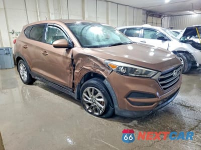 Czwarte zdjęcie samochodu z boku: 2016 HYUNDAI TUCSON SE VIN:KM8J23A43GU107396 - miniatura