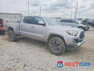 Czwarte zdjęcie samochodu z boku: 2020 TOYOTA TACOMA SR5 VIN:5TFDZ5BN2LX054912 - miniatura