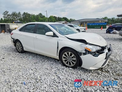 Czwarte zdjęcie samochodu z boku: 2016 TOYOTA CAMRY HYBRID XLE VIN:4T1BD1FKXGU198029 - miniatura