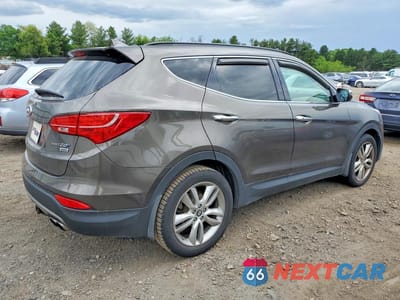 Trzecie zdjęcie samochodu z tyłu: 2014 HYUNDAI SANTA FE SPORT 2.0T VIN:5XYZWDLA4EG221751 - miniatura