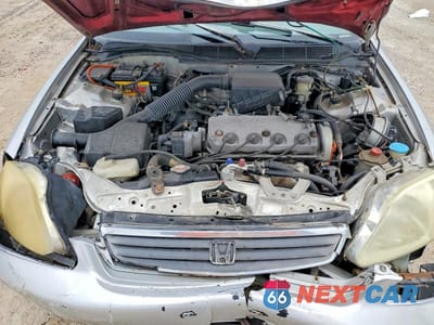 Zdjęcie 12 z 13 samochodu: 1999 HONDA CIVIC LX VIN:1HGEJ6678XL058068 - miniatura