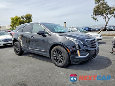 Czwarte zdjęcie samochodu z boku: 2018 CADILLAC XT5 VIN:1GYKNARS9JZ153536 - miniatura