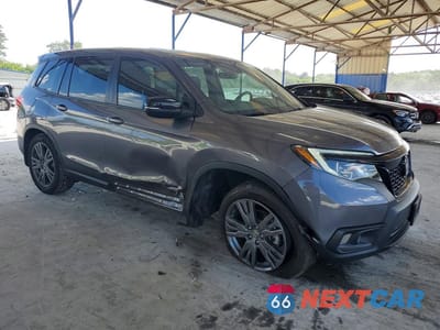 Czwarte zdjęcie samochodu z boku: 2020 HONDA PASSPORT EXL VIN:5FNYF7H50LB005926 - miniatura