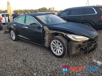Czwarte zdjęcie samochodu z boku: 2017 TESLA MODEL S VIN:5YJSA1E16HF204389 - miniatura