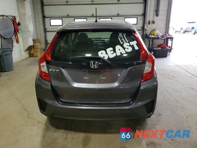 Zdjęcie 6 z 12 samochodu: 2016 HONDA FIT LX VIN:JHMGK5H52GX041039 - miniatura