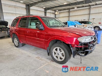 Czwarte zdjęcie samochodu z boku: 2003 OLDSMOBILE BRAVADA VIN:1GHDT13S732108484 - miniatura