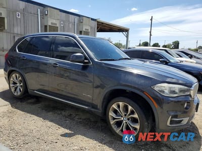 Czwarte zdjęcie samochodu z boku: 2016 BMW X5 XDR40E VIN:5UXKT0C59G0S75849 - miniatura