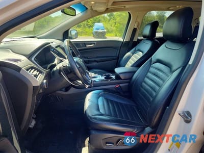 Zdjęcie 7 z 13 samochodu: 2015 FORD EDGE SEL VIN:2FMTK4J83FBB95999 - miniatura