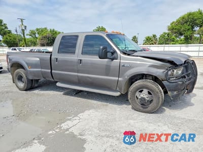 Czwarte zdjęcie samochodu z boku: 2002 FORD F350 SUPER DUTY VIN:1FTWW32F52EA43475 - miniatura