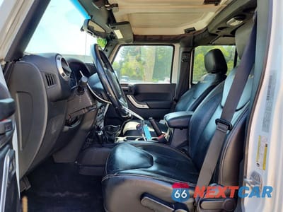 Zdjęcie 7 z 13 samochodu: 2015 JEEP WRANGLER UNLIMITED SAHARA VIN:1C4BJWEG0FL685882 - miniatura