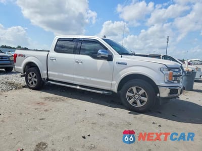 Czwarte zdjęcie samochodu z boku: 2019 FORD F150 LARIAT VIN:1FTEW1E4XKFB12696 - miniatura
