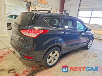 Trzecie zdjęcie samochodu z tyłu: 2015 FORD ESCAPE SE VIN:1FMCU9GX7FUB42870 - miniatura