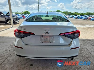 Zdjęcie 6 z 12 samochodu: 2022 HONDA CIVIC LX VIN:2HGFE2F22NH559473 - miniatura