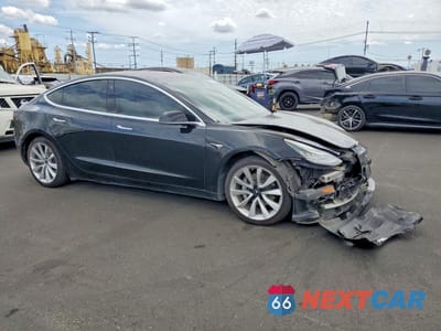 Czwarte zdjęcie samochodu z boku: 2018 TESLA MODEL 3 VIN:5YJ3E1EA8JF178022 - miniatura