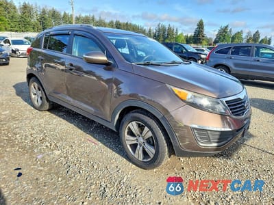 Czwarte zdjęcie samochodu z boku: 2011 KIA SPORTAGE LX VIN:KNDPB3A29B7083853 - miniatura