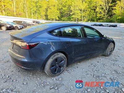 Trzecie zdjęcie samochodu z tyłu: 2022 TESLA MODEL 3 VIN:5YJ3E1EB5NF235338 - miniatura