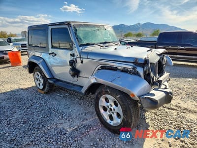 Czwarte zdjęcie samochodu z boku: 2015 JEEP WRANGLER SAHARA VIN:1C4AJWBG5FL703034 - miniatura