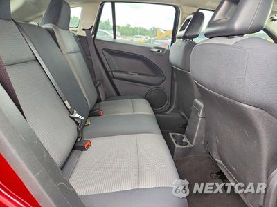 Zdjęcie 11 z 13 samochodu: 2009 DODGE CALIBER SXT VIN:1B3HB48AX9D168737 - miniatura