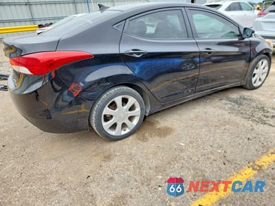 Trzecie zdjęcie samochodu z tyłu: 2013 HYUNDAI ELANTRA LIMITED VIN:KMHDH4AE1DU504899 - miniatura