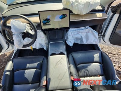 Zdjęcie 8 z 12 samochodu: 2022 TESLA MODEL Y VIN:7SAYGDEE7NF364440 - miniatura