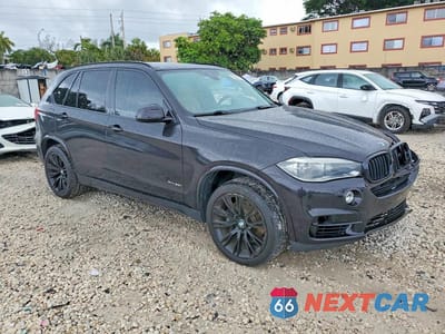 Czwarte zdjęcie samochodu z boku: 2016 BMW X5 XDRIVE50I VIN:5UXKR6C50G0J81005 - miniatura