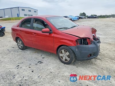 Czwarte zdjęcie samochodu z boku: 2011 CHEVROLET AVEO LS VIN:KL1TD5DE0BB237056 - miniatura