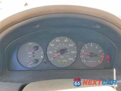 Zdjęcie 9 z 12 samochodu: 1999 MAZDA PROTEGE DX VIN:JM1BJ2228X0194402 - miniatura