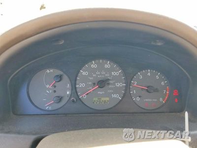 Zdjęcie 9 z 12 samochodu: 1999 MAZDA PROTEGE DX VIN:JM1BJ2228X0194402 - miniatura