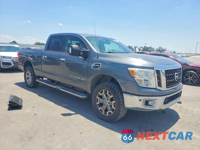 Czwarte zdjęcie samochodu z boku: 2016 NISSAN TITAN XD SV VIN:1N6BA1F43GN506244 - miniatura